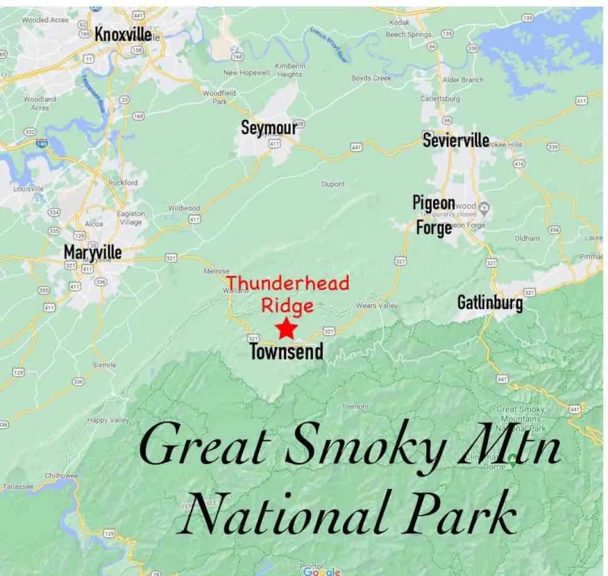 A sweeping panoramic view of the Great Smoky Mountains National Park, Thunderhead Ridge, and Townsend area. The landscape is lush and expansive, inviting exploration and promising plenty of opportunities for outdoor adventures.